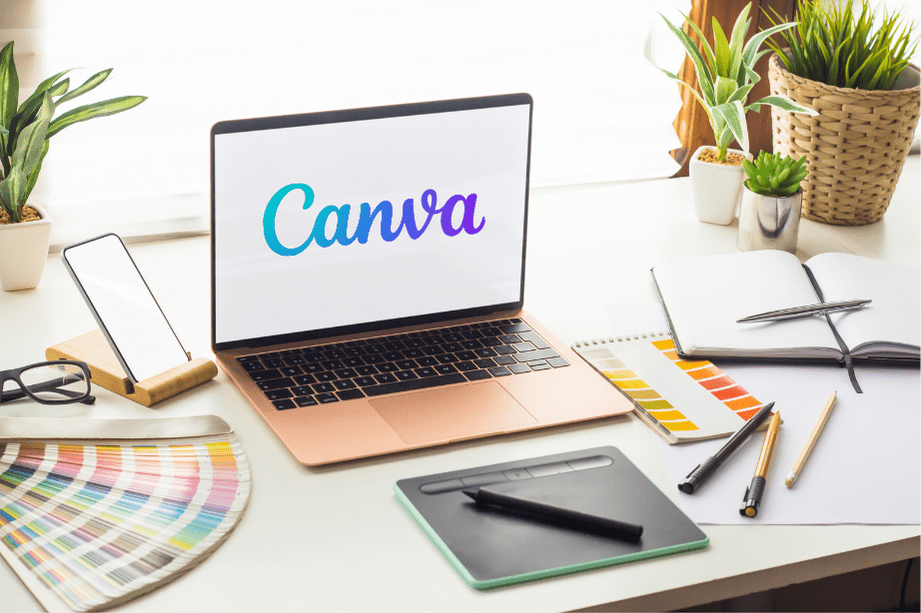 A laptop of a freelancer showing the Canva logo
